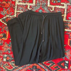 Black Crane pants in black, size XS